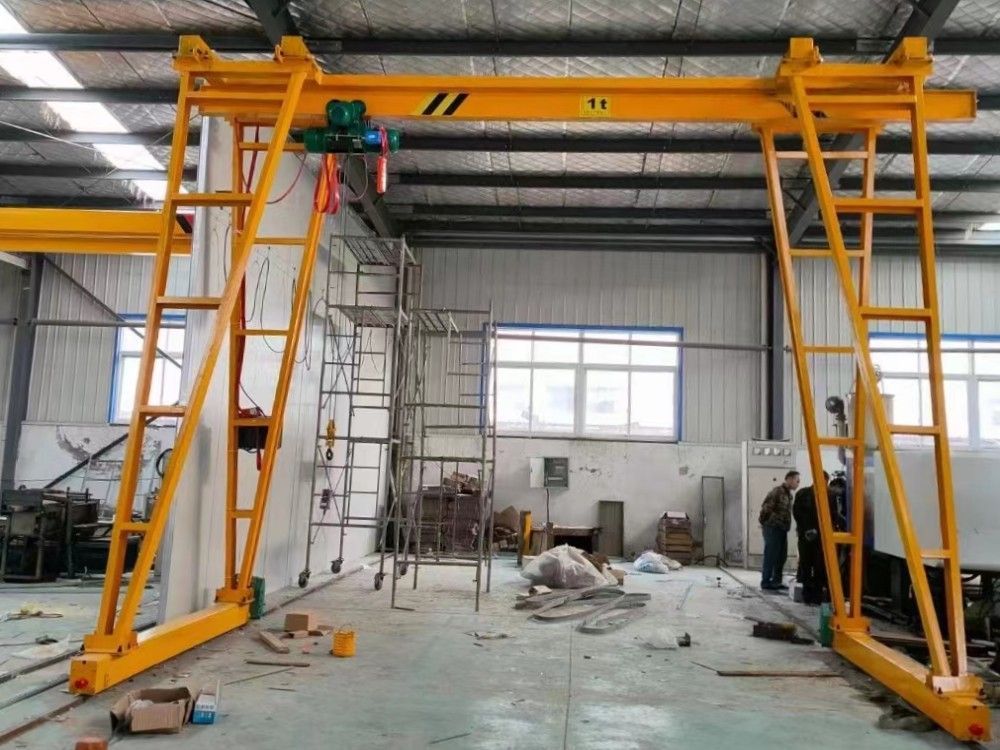龍門吊廠家生產(chǎn)，手推型/電動型小型門式起重機制造安裝調試